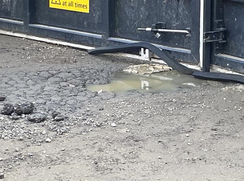 Photo of seal coming away from flood gate - supporting image