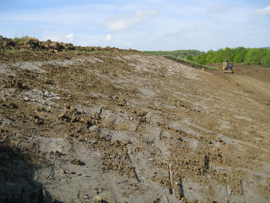 Photos of exposed structural clay following removal of slipped topsoil, and of completed works - supporting image