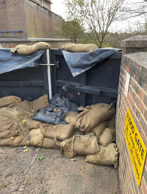 Photo of seal coming away from flood gate - supporting image