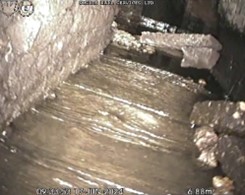 Photos showing CCTV survey, debris washed through during scour test and the void from above - supporting image
